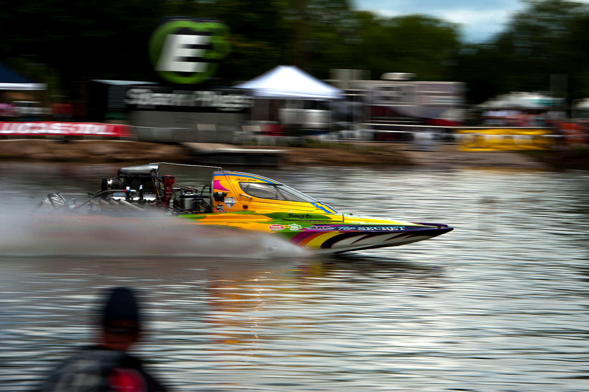 Shawn Reed, driver of “Top Secret” races across Lake Nasworthy during the 2015 showdown in San Angelo Super Nationals drag boat races at Lake Nasworthy in San Angelo, Texas, June 27. The annual boat race hosted hydro drag boats that reached speeds up to 250 mph in a quarter mile race. (U.S. Air Force photo by Airman 1st Class Devin Boyer/Released)