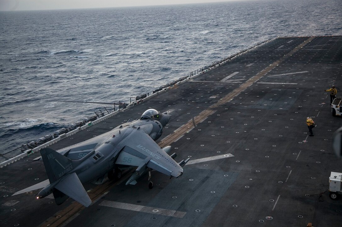 GULF OF ADEN (June 28, 2015) An AV-8B Harrier from the “Greyhawks” of Marine Medium Tiltrotor Squadron 161 (Reinforced), 15th Marine Expeditionary Unit, launches from the flight deck of the amphibious assault ship USS Essex (LHD 2). The pilots maintain their flight readiness by performing take-off and landing drills. The 15th MEU is embarked on the Essex Amphibious Ready Group and deployed to maintain regional security in the U.S. 5th Fleet area of operations. (U.S. Marine Corps photo by Cpl. Elize McKelvey/Released)