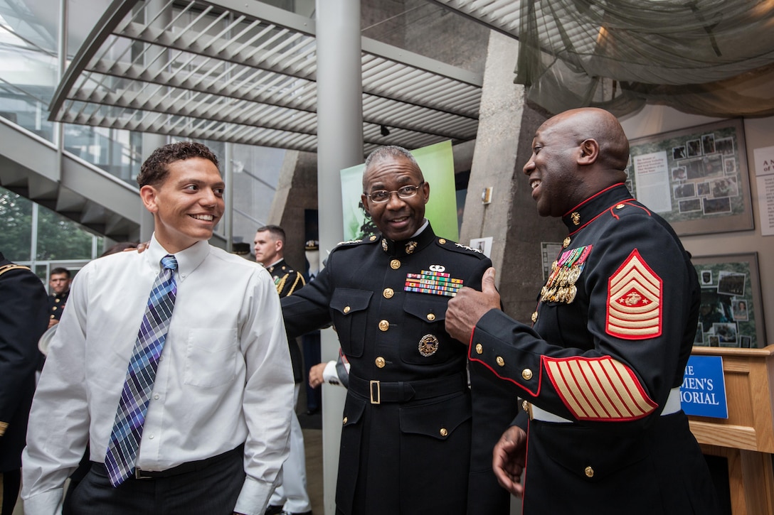 Sgt. Maj. of the Marine Corps Ronald L. Green speaks with guests during a Sunset Parade reception held at the Women in Military Service for America Memorial, Arlington, Va., June 29, 2015. (U.S. Marine Corps photo by Sgt. Melissa Marnell/Released)