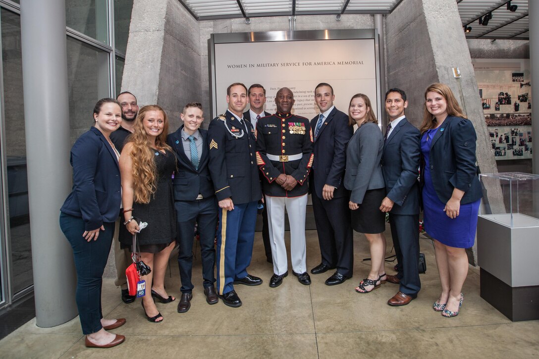 Sgt. Maj. of the Marine Corps Ronald L. Green poses for a photo with guests during a Sunset Parade reception held at the Women in Military Service for America Memorial, Arlington, Va., June 29, 2015. (U.S. Marine Corps photo by Sgt. Melissa Marnell/Released)