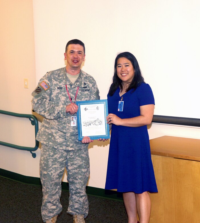 Lt. Col. Charles Gray, Deputy Commander, presents Mayor Lisa Wong with a certificate of appreciation for her presentation to the New England District on May 28, 2015.