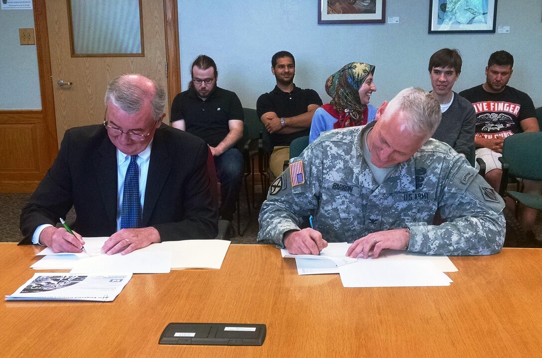 Col. Christopher Barron, New England District Commander, entered into an education partnership agreement with MassBay Community College, May 26, 2015.  Col. Barron and John O’Donnell, President of MassBay Community College signed the agreement at the Wellesley, Massachusetts Campus.