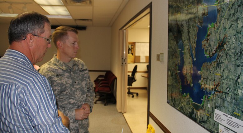 Michael Kinard, Lavon Lake Project Manager, discusses recent heavy rains in the Dallas area with Southwestern Division commander Brig. Gen. David C. Hill.  