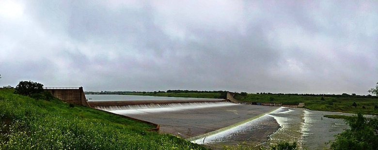 Water flows over the spillway at Lewisville Lake near Dallas after heavy rains in the area in May.  About 35 trillion gallons of rain fell across Texas alone in May, with heavy rains also in Oklahoma and Arkansas, putting Army Corps of Engineers reservoirs and flood risk reduction structures to the test.  