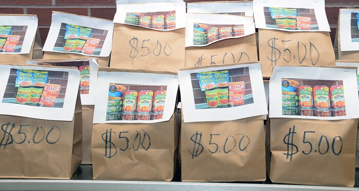 Bags of food items patrons may purchase for donation sit on a shelf at Marine Corps Logistics Base Albany’s Commissary. The base’s Commissary is among commissaries serving as collection points for the “Feds Feed Families” campaign, which ends Aug. 31 at participating stateside military installations. During this campaign, participating installations help collect items most needed by food pantries and then donate them to area food banks.