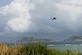 A HH-60G Pave Hawk from the 33rd Rescue Squadron flies off the coast of Okinawa, Japan, during a large-force exercise June 30, 2015. The exercise, which integrated Air Force and Marine Corps assets on Okinawa, was designed to allow the units to practice air-to-air capabilities while supporting ground troops. (U.S. Air Force photo/Staff Sgt. Maeson L. Elleman)