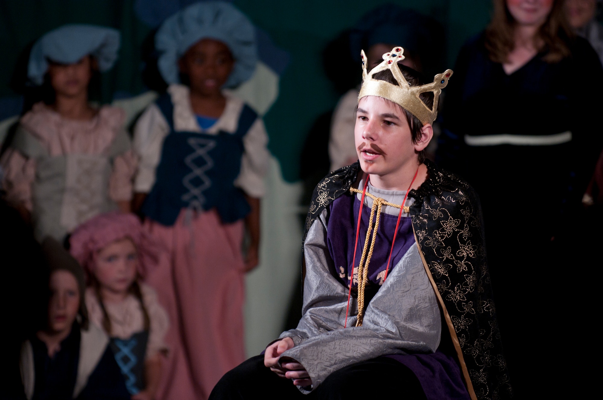 Alex Pachniak, as King Arthur, contemplates the challenges facing his kingdom during the play “King Arthur’s Quest” June 26, 2015, in the Youth Center on F.E. Warren Air Force Base, Wyo. Pachniak is the son of Thomas Pachniak, 90th Civil Engineer Squadron Heavy Repair section chief. (U.S. Air Force photo by Airman 1st Class Malcolm Mayfield)