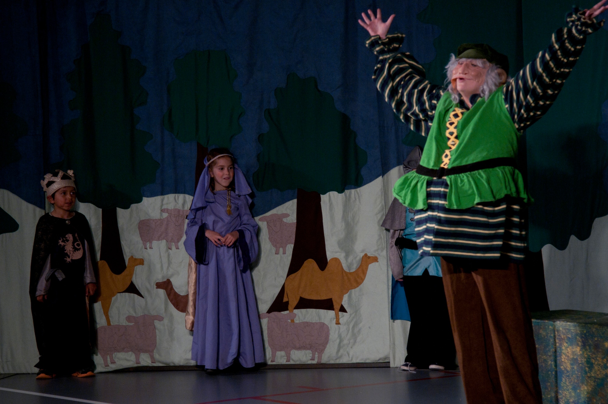 Jessica Foley, Missoula Children’s Theatre Tour actor and director, acts as a giant during the play “King Arthur’s Quest” June 26, 2015. The play was performed at the Youth Center on F.E. Warren Air Force Base, Wyo. (U.S. Air Force photo by Airman 1st Class Malcolm Mayfield)