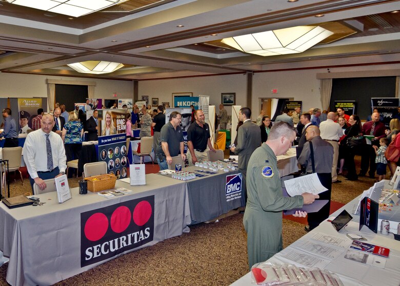 Members of the Nellis community attend a job fair for the Airman and Family Readiness Center’s Employment Assistance Program at Nellis Air Force Base, Nev., April 23, 2015. The Employment Assistance Program helps separating military members transition out of the military, and aids military spouses in finding employment. The A&FRC brings local, national and global employers to the job fair to network with Airmen and their spouses. (Courtesy photo)