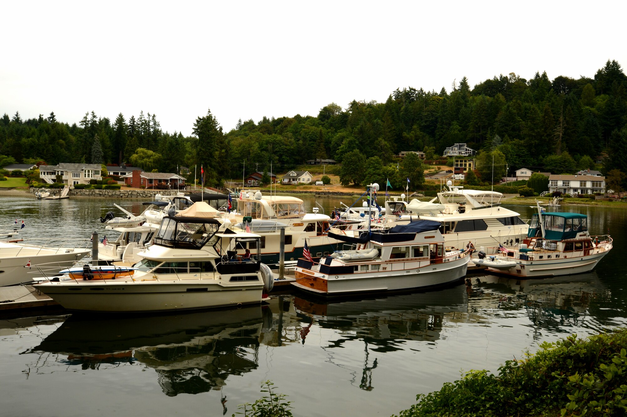 Yachts from the Tacoma Yacht Club are docked June 24, 2015, at Wollochet Bay Outstation, Wash., for the 2015 Evergreen Fleet Cruise. The Evergreen Fleet Cruise, presented by the Tacoma-Pierce County Chamber Military Affairs Committee, fosters the networking and community links between the senior military leaders of the Puget Sound and local civic and business leaders. (U.S. Air Force photo\Staff Sgt. Katie Jackson)