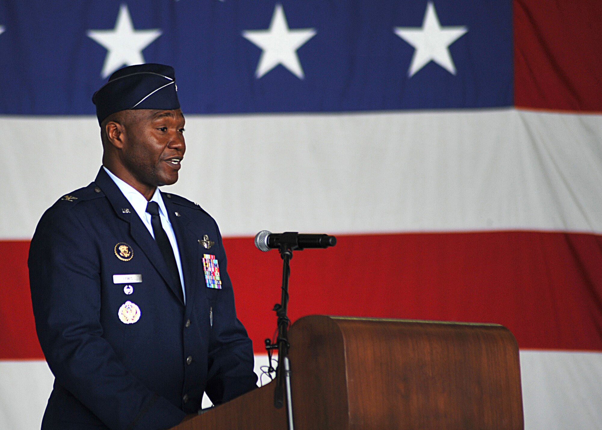 Col. Rodney Lewis, 319th Air Base Wing commander, gives a speech on July 1, 2015 during the 319th ABW change of command ceremony on Grand Forks Air Force Base, N.D. Lewis assumed command from Col. Paul Bauman. (U.S. Air Force Photo by Senior Airman Xavier Navarro/released)