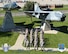 Members of the 132d Wing (132WG), Des Moines, Iowa 232d Intelligence Squadron gather for a group photo in front of the static display at the 132WG on Friday, June 19, 2015.  (U.S. Air National Guard photo illustration by Tech. Sgt. Linda K. Burger/Released)(This image was manipulated using Photoshop filters and dodging and burning techniques; AF/ANG and Wing logos were added to the lower left and right corners, along with text on the bottom portion of the image.)