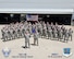 Members of the 132d Wing (132WG), Des Moines, Iowa Logistics Readiness Squadron gather for a group photo at the 132WG on Friday, June 19, 2015.  (U.S. Air National Guard photo illustration by Tech. Sgt. Linda K. Burger/Released)(This image was manipulated using Photoshop filters and dodging and burning techniques; AF/ANG and Wing logos were added to the lower left and right corners, along with text on the bottom portion of the image.)