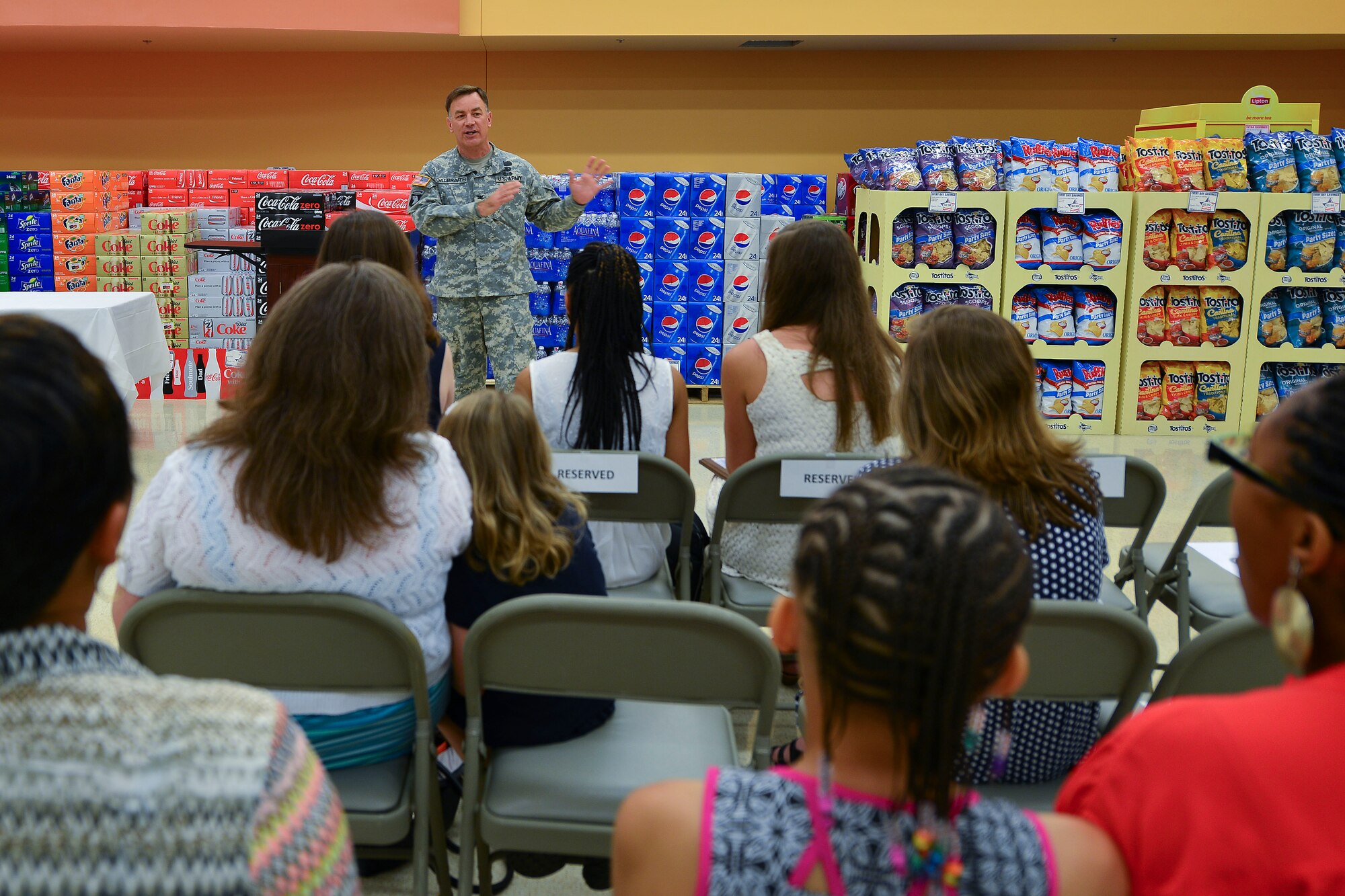 U.S. Army Col. William Galbraith, 733rd Mission Support Group commander, speaks to scholarship award winners and their families during the Scholarships for Military Children recognition ceremony at Fort Eustis, Va., June 30, 2015. Galbraith discussed the students’ achievements and encouraged them to continue to excel. (U.S. Air Force photo by Staff Sgt. Natasha Stannard)
