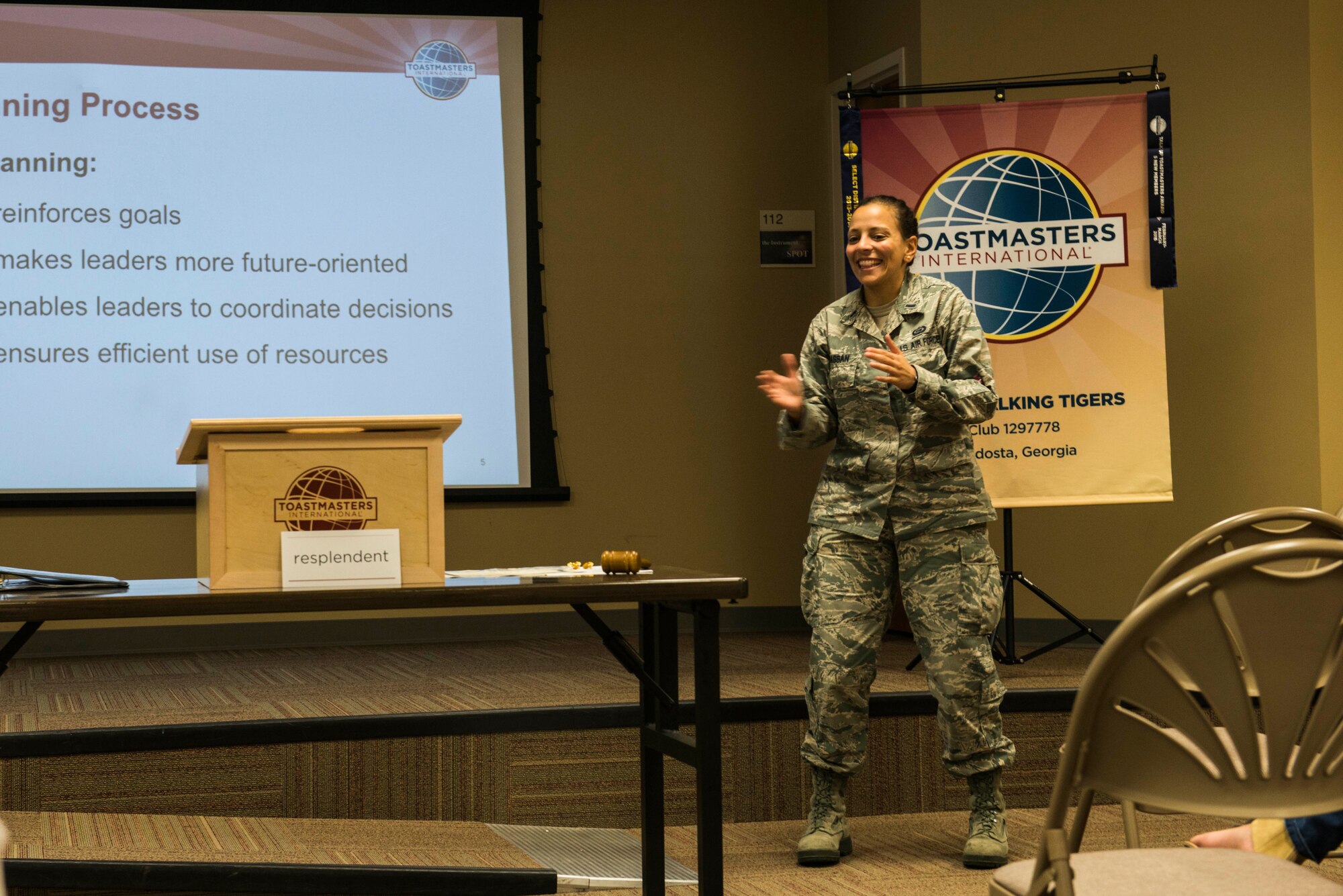 U.S. Air Force 1st Lt. Farrah Hassan, 23d Operations Support Squadron intelligence officer, performs an impromptu skit during the 2015 Moody Talking Tigers inauguration ceremony June 25, 2015, at Moody Air Force Base, Ga. Hassan and two other Talking Tigers performed skits and the audience voted on the best performance. (U.S. Air Force photo by Airman 1st Class Dillian Bamman/Released)