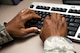 Tech. Sgt. Sakima McCordy checks the results of a software test June 26 at Scott Air Force Base, Illinois. McCordy checks software test results weekly. McCordy is the 375th Communications Support Squadron Air Mobility Command Information Assurance NCOIC. (U.S. Air Force Photo by Airman 1st Class Megan Friedl)