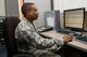 Tech. Sgt. Sakima McCordy checks the results of a software test June 26 at Scott Air Force Base, Illinois. McCordy checks software test results weekly. McCordy is the 375th Communications Support Squadron Air Mobility Command Information Assurance NCOIC. (U.S. Air Force Photo by Airman 1st Class Megan Friedl)