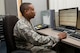 Tech. Sgt. Sakima McCordy checks the results of a software test June 26 at Scott Air Force Base, Illinois. McCordy checks software test results weekly. McCordy is the 375th Communications Support Squadron Air Mobility Command Information Assurance NCOIC. (U.S. Air Force Photo by Airman 1st Class Megan Friedl)