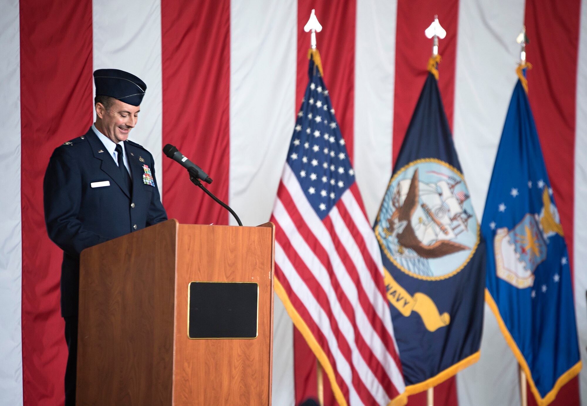 Col. Gregory McClure, 87th Civil Engineer Group commander, speaks during the 87th CEG activation and assumption of command ceremony July 1, 2015 at Joint Base McGuire-Dix-Lakehurst, N.J. The unit now supports the nation’s only tri-service joint base, which includes responsibility of 42,000 acres of property and more than 5,000 facilities. (U.S. Air Force photo by Staff Sgt. Katherine Tereyama)