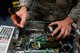 Senior Airman Daniel Willet troubleshoots a computer June 26 at Scott Air Force Base, Illinois. Willet checks base computers to fix technical issues. Willet is a 375th Communications Support Squadron Information Assurance Technician. (U.S. Air Force Photo by Airman 1st Class Megan Friedl)