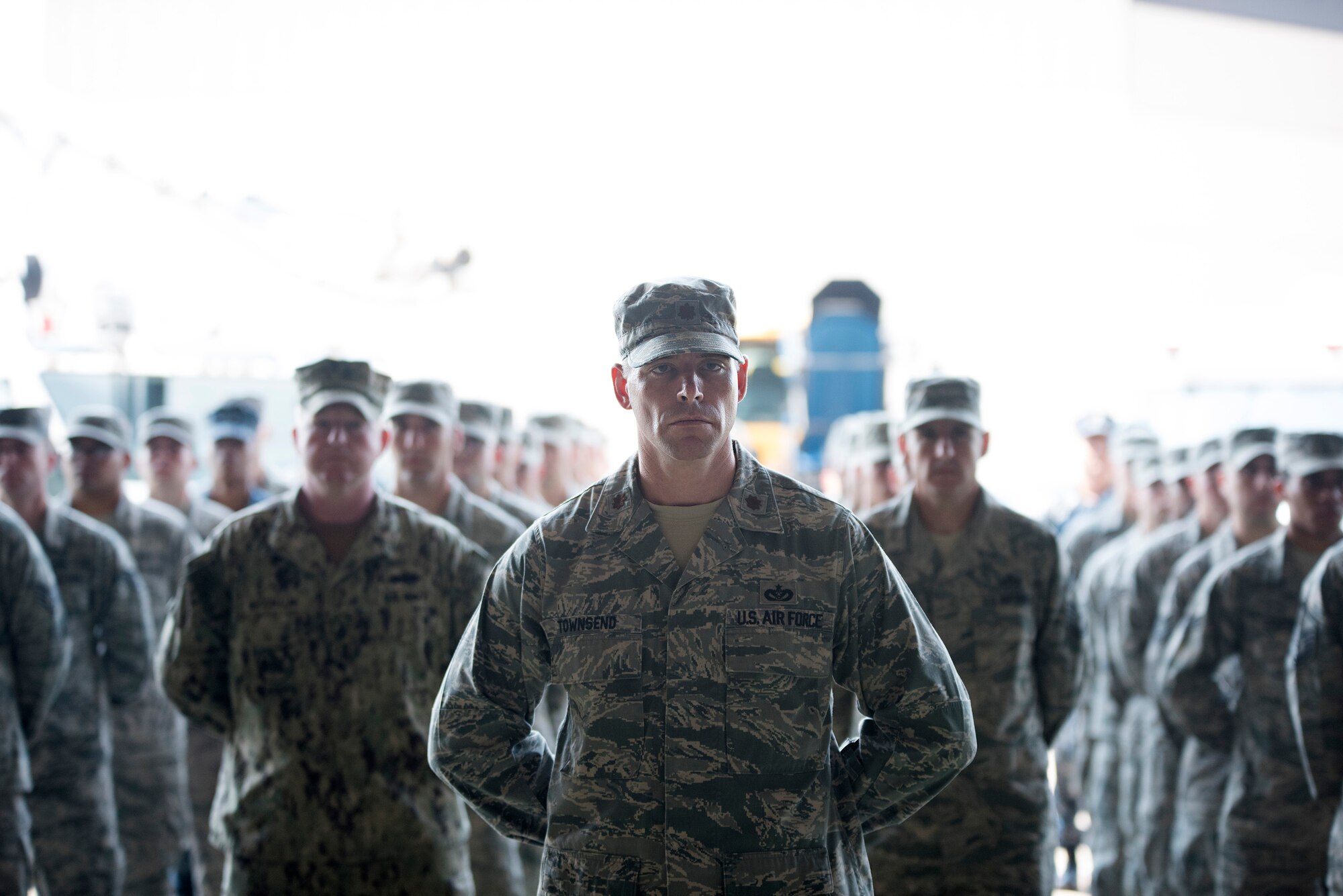 Maj. Clint Townsend, 87th Civil Engineer Squadron, leads a flight of Airmen and Sailors during the 87th Civil Engineer Group activation and assumption of command ceremony July 1, 2015 at Joint Base McGuire-Dix-Lakehurst, N.J. The group, which was previously under the 87th Mission Support Group as a squadron, has been stood up to compensate for increases in acreage and facilities since the assimilation of the joint base. (U.S. Air Force photo by Staff Sgt. Katherine Tereyama)