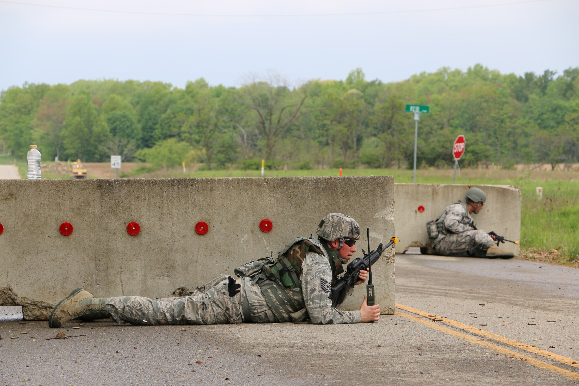 Members of the 200th RED HORSE, Detachment 1, Mansfield, OH, perform various training exercises during a Field Training Exercise (FTX) on May 16, 2014. The exercise is focused on simulation of deployed environments and defense from hostile enemy actions. (U.S. Air National Guard Photo by Tech. Sgt. Joe Harwood\Released)