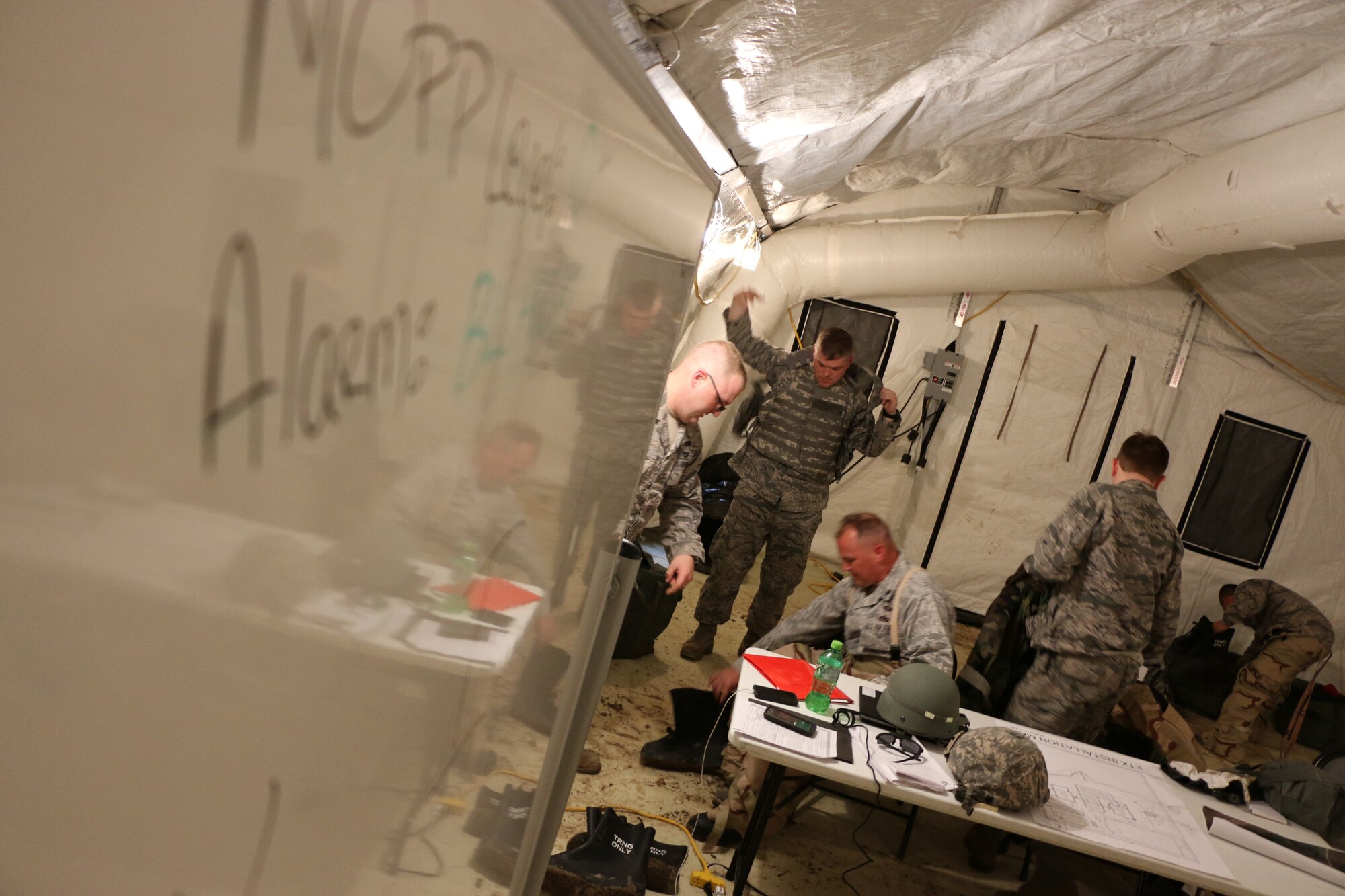 Members of the 200th RED HORSE, Detachment 1, Mansfield, OH, perform various training exercises during a Field Training Exercise (FTX) on May 16, 2014. The exercise is focused on simulation of deployed environments and defense from hostile enemy actions. (U.S. Air National Guard Photo by Tech. Sgt. Joe Harwood\Released)