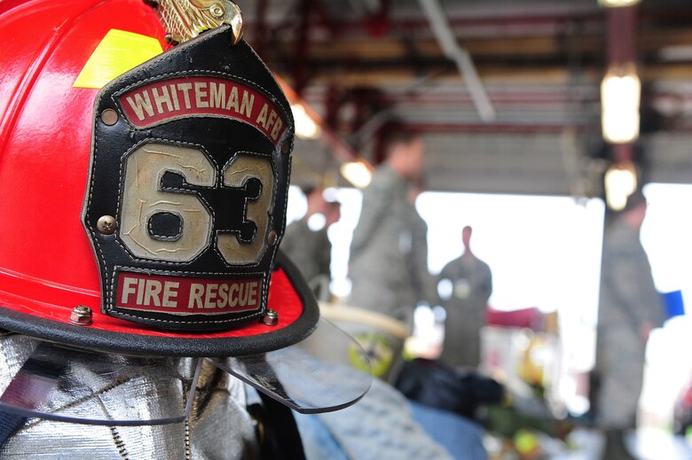 A helmet waits to be used by firefighters from the 509th Civil Engineer Squadron at Whiteman Air Force Base, Mo., May 28, 2015. The helmet symbolizes camaraderie and brotherhood, and is a badge of honor for risking their lives to save others. (U.S. Air Force photo by Senior Airman Keenan Berry/Released)
