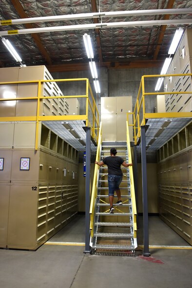 Annette Perez, 341st Logistics Readiness Squadron materiel management repair cycle, checks supply stock after a recent upgrade to the storage aid systems at the Central Storage Element June 30, 2015, at Malmstrom Air Force Base, Mont. With more than 100,000 pieces of inventory the CSE is critical to the base having the supplies and equipment on hand.  (U.S. Air Force photo/Chris Willis)