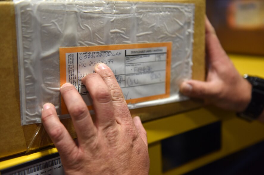 Jason Garneau, 341st Logistics Readiness Squadron materiel management flight service center, performs an inventory check at the Central Storage Element June 30, 2015, at Malmstrom Air Force Base, Mont. The CSE is responsible for storing supply and equipment items that include classified, sensitive, cryptographic, communication security and nuclear weapons related material. (U.S. Air Force photo/Chris Willis)