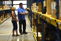 Eileen Gort and Jason Garneau, 341st Logistics Readiness Squadron materiel management flight service center, perform inventory checks at the Central Storage Element June 30, 2015, at Malmstrom Air Force Base, Mont. The CSE is responsible for storing supply and equipment items that include classified, sensitive, cryptographic, communication security and nuclear weapons related material. (U.S. Air Force photo/Chris Willis)