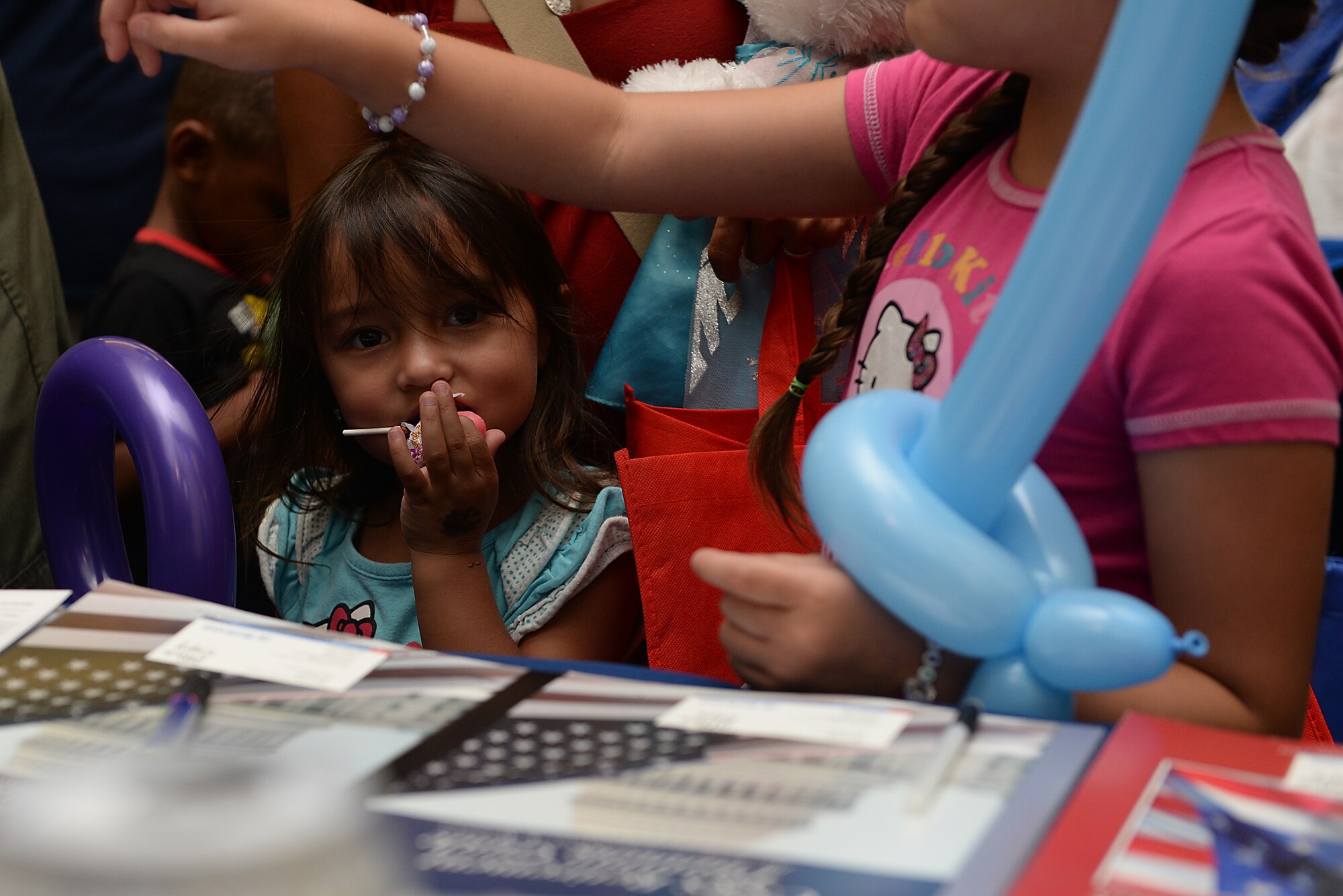 Many base organizations and local community sponsors supported Scott's base-wide picnic June 26, 2015 at Scott Air Force Base, Ill. Members of Team Scott visited the various booths for giveaways , promotional items, prizes, and brief information on each organization. (U.S. Air Force photo/ Airman 1st Class Kiana Brothers)