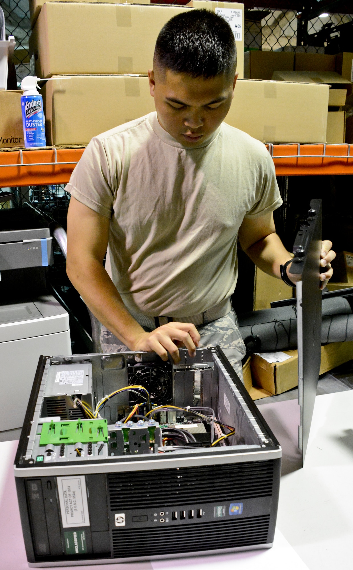 Airman 1st Class Mark Baccaro, 60th Medical Support Squadron systems warehouse technician, analyzes equipment June 24 at Travis Air Force Base, California. The information flight is comprised of approximately 60 people who are responsible for keeping every computer and communication system in David Grant USAF Medical Center, the largest inpatient medical treatment facility in the Air Force, up to date and functioning properly. (U.S. Air Force photo by Airman 1st Class Amber Carter)