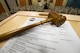 A Toastmasters gavel rests on a podium before the 2015 Moody Talking Tigers inauguration ceremony June 25, 2015, at Moody Air Force Base, Ga. The Talking Tigers host weekly meetings where members perform speeches and impromptu skits to improve their public-speaking skills. (U.S. Air Force photo by Airman 1st Class Dillian Bamman/Released)