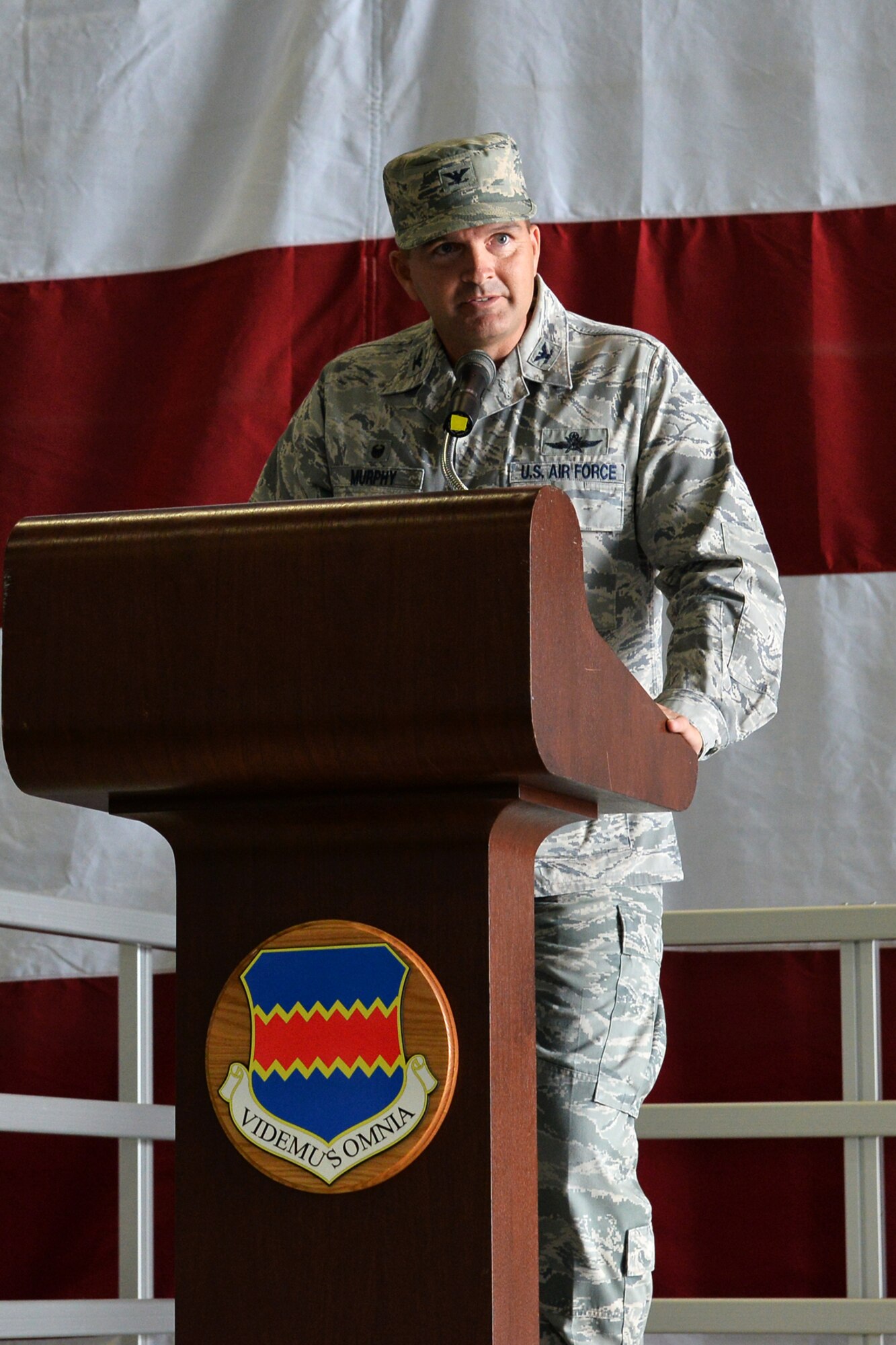 U.S. Air Force Col. Sean Murphy, 55th Communications Group commander, speaks to those in attendance at the 55th CG assumption of command ceremony June 30 at the Bennie Davis Maintenance Facility at Offutt Air Force Base, Nebraska. Murphy comes to Offutt from Hawaii where he served as the C4 Strategy, Integration, Resources and Requirements Division chief in the J6 directorate at United States Pacific Command. (Photo by Charles Haymond)