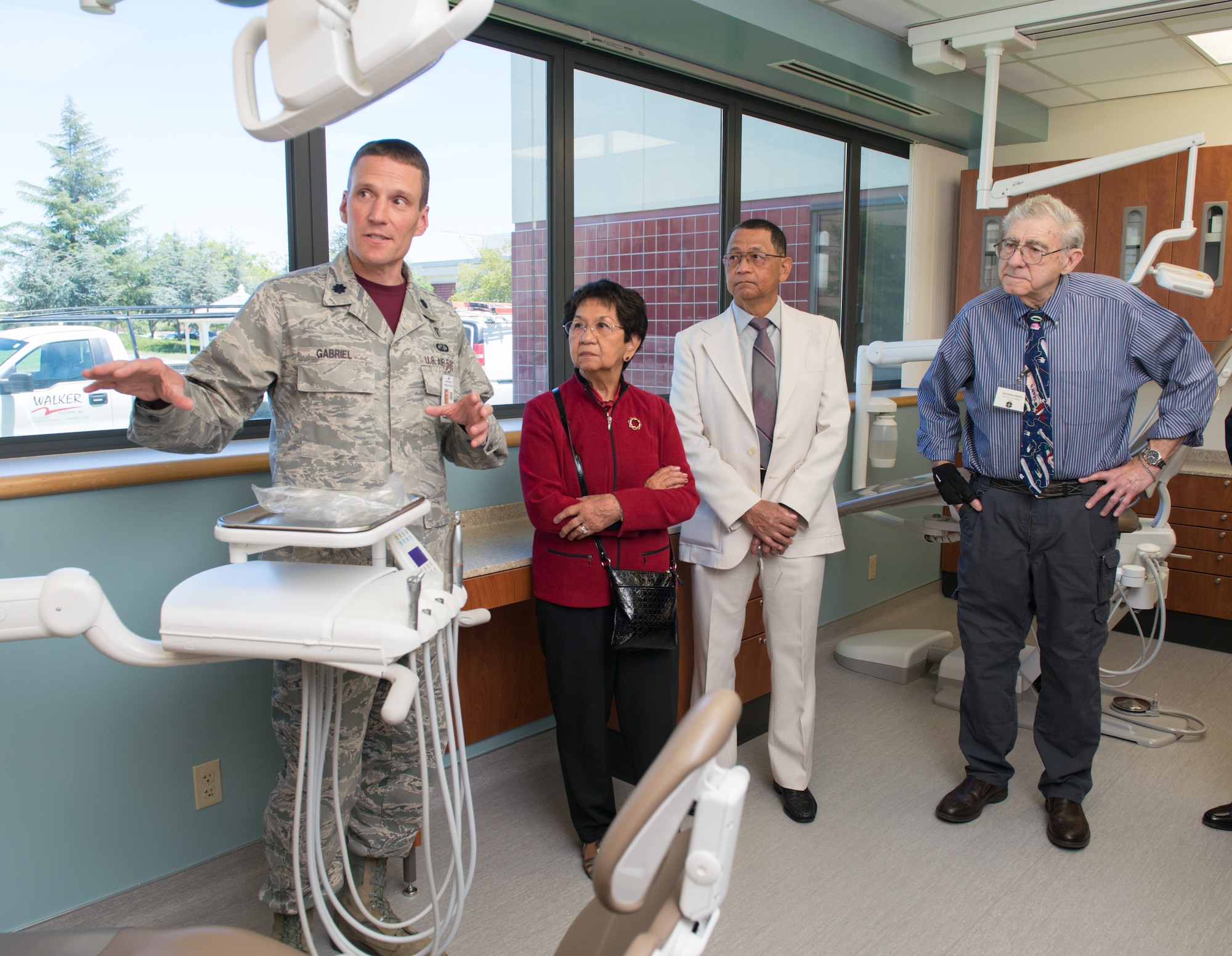 Following the ribbon cutting ceremony June 19, 2015 at the Arthur J. Sachsel Dental Clinic at Travis Air Force Base, California, guests were given a tour of the renovated dental clinic, which now has many state-of-the art instruments, such as a relatively quiet dentist's drill. (U.S. Air Force photo by Ken Wright)