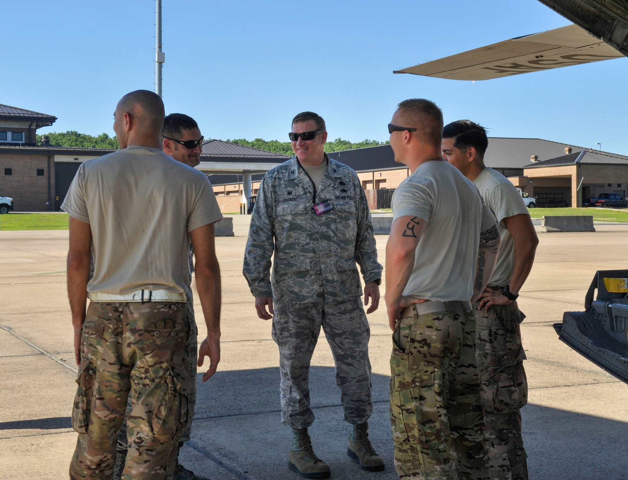 Col. Daniel Lockert, 19th Maintenance Group commander and Chief Master Sgt. Bubba Beason, 19th Aircraft Maintenance Squadron section chief, visit with Airmen as they prepare to embark on an iron swap mission June 9, 2015, at Little Rock Air Force Base, Ark. An iron swap mission exchanges  an aircraft from downrage that has maintenance issues with one from home station that is ready for the rigors of deployment operations. (U.S. Air Force photo by Senior Airman Stephanie Serrano)