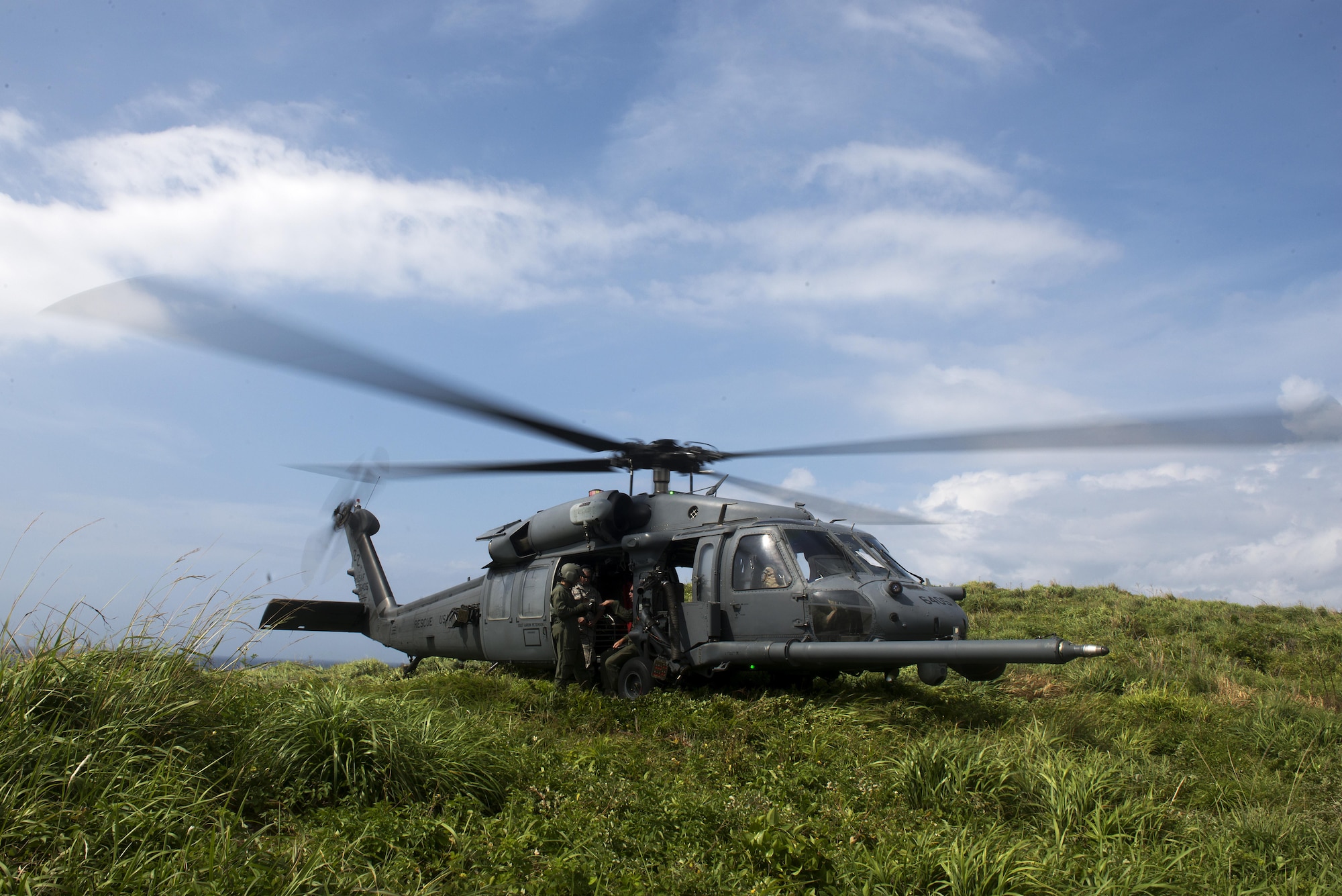 A U.S. Air Force HH-60G Pave Hawk helicopter from the 33rd Rescue Squadron lands on a small island off the coast of Okinawa, Japan, during a large force exercise June 30, 2015. During the exercise, U.S. Air Force flying squadrons from Kadena Air Base, Japan, partnered with Vermont Air National Guard F-16 Fighting Falcons and U.S. Marine Corps units from Marine Corps Air Station on Okinawa in order to improve interservice interoperability in the region. (U.S. Air Force photo by Staff Sgt. Maeson L. Elleman)