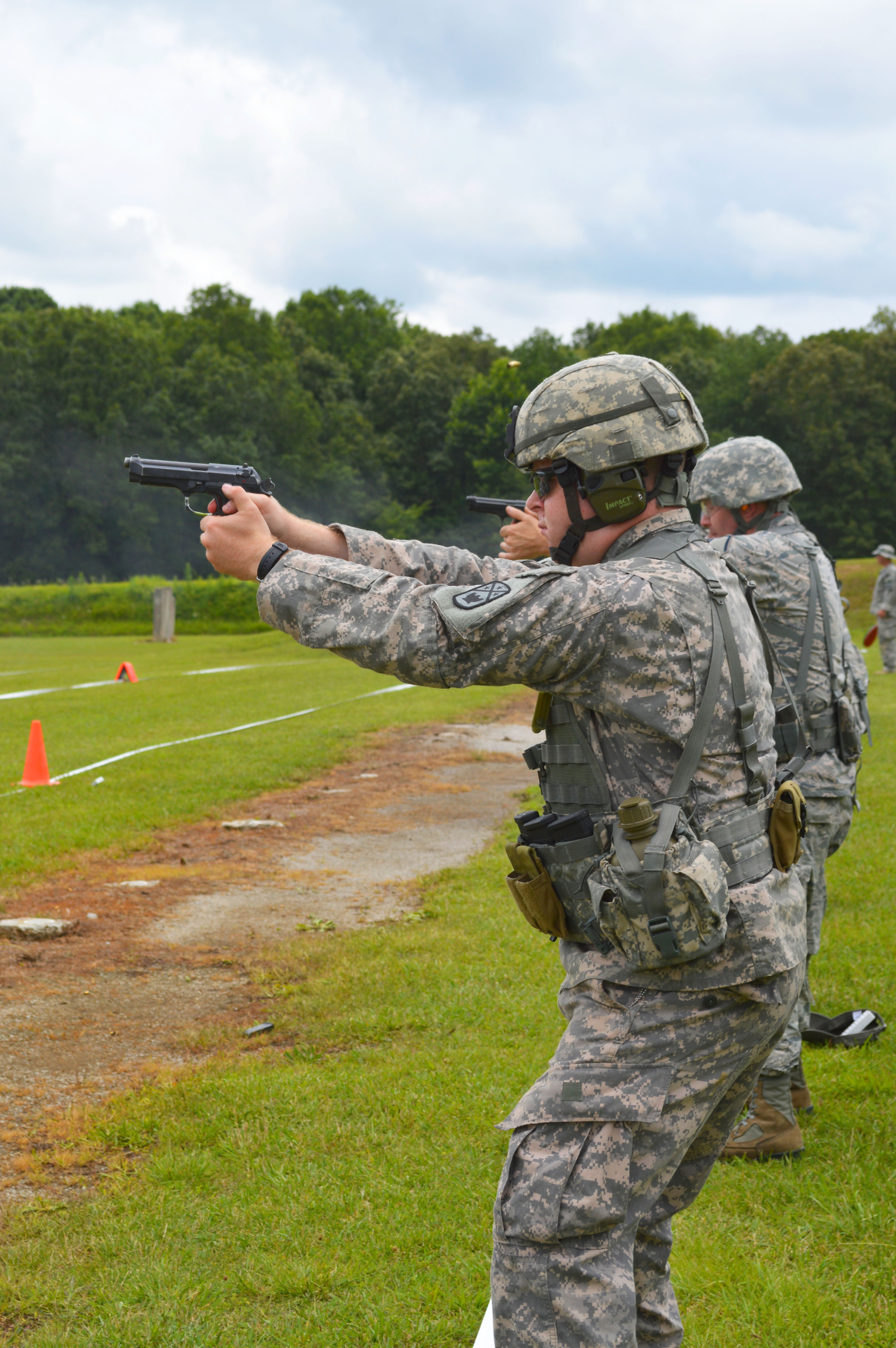 Tennessee Army National Guard Sgt David Caldwell Fires His Pistol At Targets Down Range During 8964