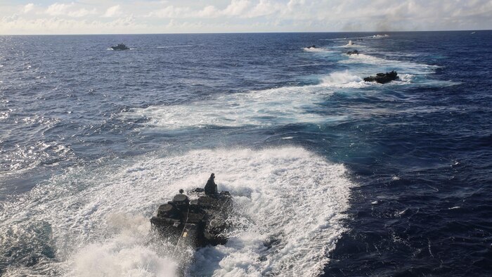 ATU.S. Marine Corps AAV-P7/A1 Amphibious Assault Vehicles disembark from the USS Ashland (LSD 48) during splash and recovery training June 10, 2015. The AAV's are with Battalion Landing Team 2nd Battalion, 5th Marines, 31st Marine Expeditionary Unit. The Marines with BLT 2/5 and the rest of the 31st MEU are currently deployed on the regularly scheduled Fall Patrol of the Asia-Pacific region. 