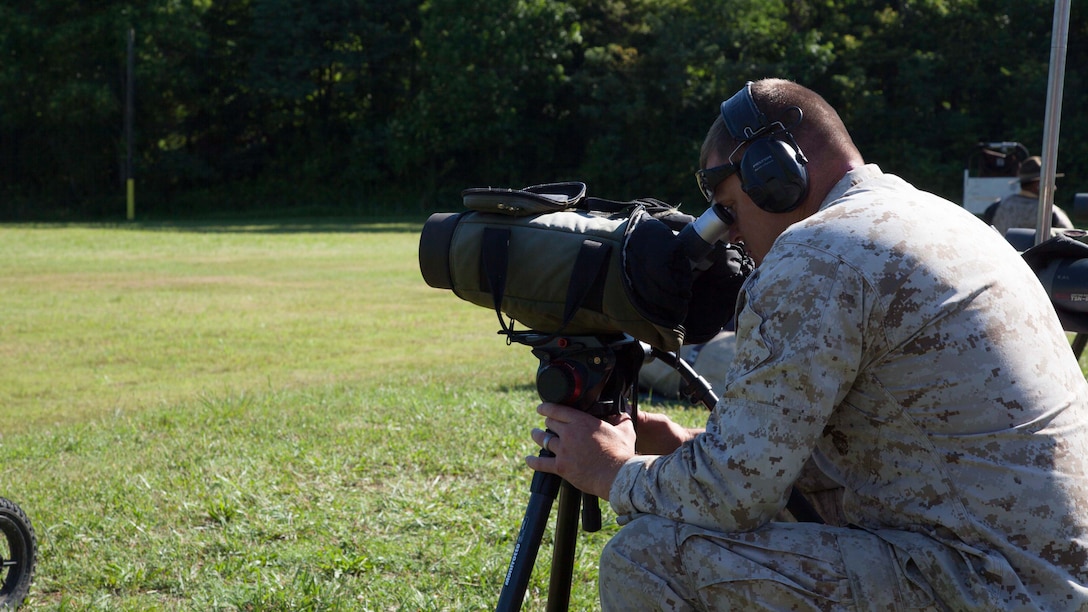 Staff Sgt. Mark R. Altendorf looks through a scope during the 54th Interservice Rifle Championship at Marine Corps Base Quantico, Virginia, June 29, 2015. This will be the final match before the Marine Corps Shooting Team will compete at the National Rifle Matches held at Camp Perry, Ohio. Altendorf is a coach with the Marine Corps Shooting Team. 