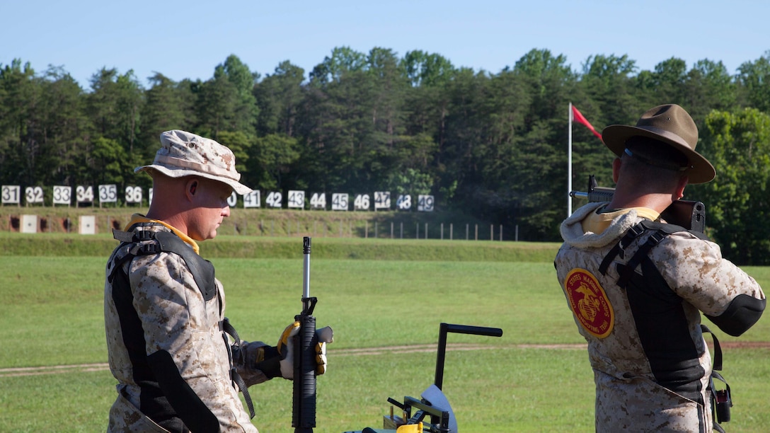 Marines with the Marine Corps Shooting Team compete during the 54th Interservice Rifle Championship at Marine Corps Base Quantico, Virginia, June 25, 2015. The members of the shooting team are hand picked from across the Marine Corps that display excellence in marksmanship and conduct as a Marine.