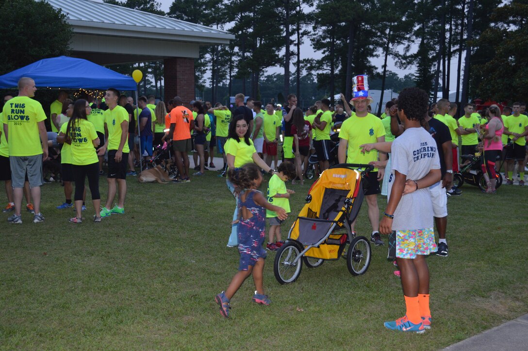 The 8th Communication Battalion Glow. Friends and family took time out of their evening to enjoy a festive and lively night out while running/walking in a 5K glow run. Music, face painting, coloring, and a black light photo booth were some of the highlighted activities for families to take part in. Runners/walkers enjoyed a nice night and a great time with friends as they crossed the finish line with smiles on their faces and enjoyed some fresh fruit and conversation with new friends