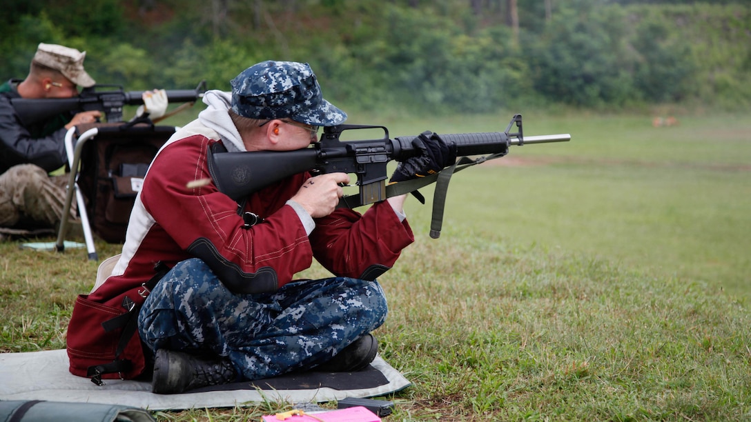 U.S. Navy Lt. Cmdr. Robert Blanchard fires his M16A4 service rifle during the 54th Interservice Rifle Championship at Marine Corps Base Quantico, June 30, 2015. Service members from all branches of the military competed against one another in multiple matches to test their marksmanship skills. Blanchard is a member of the U.S. Navy Marksmanship Team.