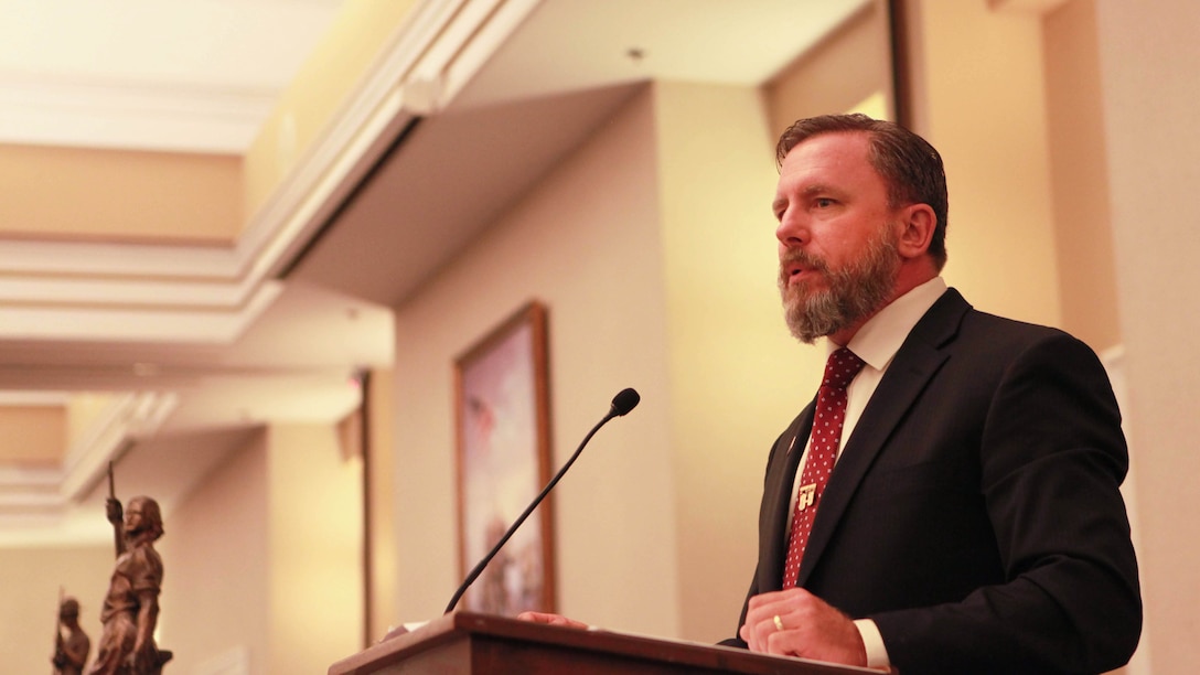 Marine Corps Chief Warrant Officer Martin W. Dankanrich (ret.) speaks during the award ceremony of the 54th Interservice Rifle Championship at Marine Corps Base Quantico, Virginia, July 1, 2015. Dankanrich was the guest of honor at the ceremony, and spoke on behalf of the competitors and congratulated them on their excellence in marksmanship.