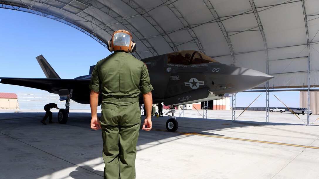 A F-35B Lightning II with Marine Operational and Test Evaluation Squadron 22 sit under a canopy after just landing aboard Edwards Air Force Base, California, Oct. 9, 2014. This is the squadron’s first F-35 Lightning II.