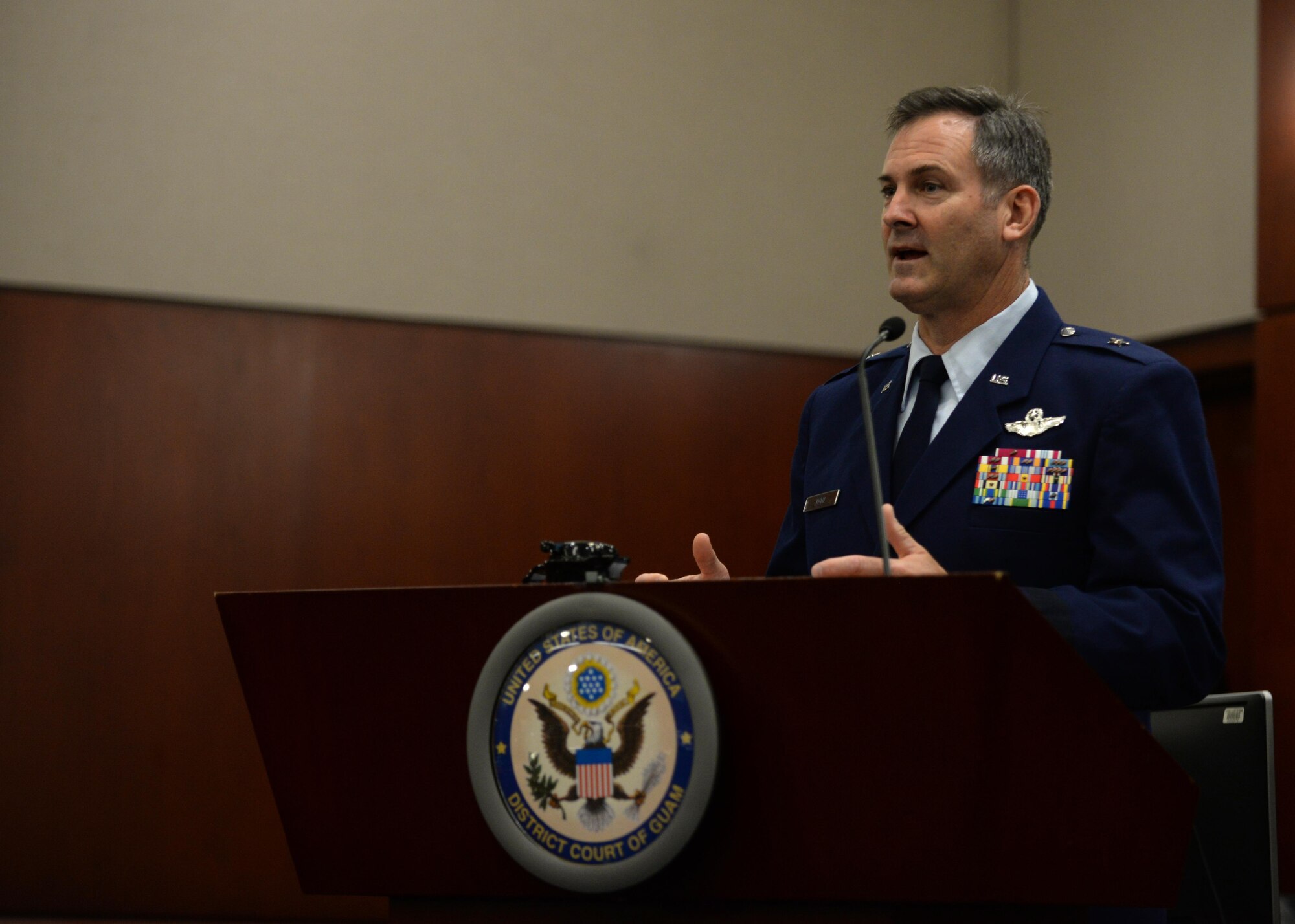 U.S. Air Force Brig. Gen. Andrew Toth, 36th Wing commander, addresses 24 new U.S. citizens during a naturalization ceremony July 2, 2015, in Hagåtña, Guam. Toth encouraged the recipients to value their heritage, while embracing their identity as Americans. (U.S. Air Force photo by Senior Airman Alexander W. Riedel/Released)