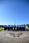 Members of the 747th Communications Squadron salute the U.S. flag during a Reveille ceremony on Joint Base Pearl Harbor-Hickam, Hawaii, July 2, 2015.The ceremony was performed by 60 Airmen from the 747th CS in honor of Independences Day. (U.S. Air Force photo by Tech. Sgt. Aaron Oelrich by Released)   