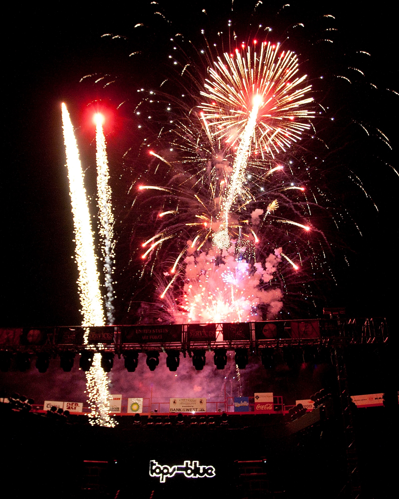 Fireworks burst in the air, lighting up the night sky. Fireworks add color and light to any Fourth of July celebration, but their misuse can lead to mishaps. (U.S. Air Force photo by Rich Oriez)