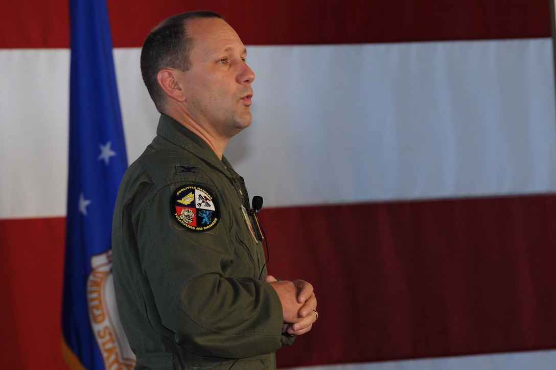 Col. Gentry Boswell, 28th Bomb Wing commander, speaks to Airmen in the Pride Hangar at Ellsworth Air Force Base, S.D., July 2, 2015. Boswell addressed Ellsworth’s enlisted and officers in his first commander’s call to voice his zero-tolerance policy on sexual assault and drug use, his priorities of living the Air Force core values and his thoughts on being proficient at the job. (U.S. Air Force photo by Senior Airman Hailey R. Staker/Released)